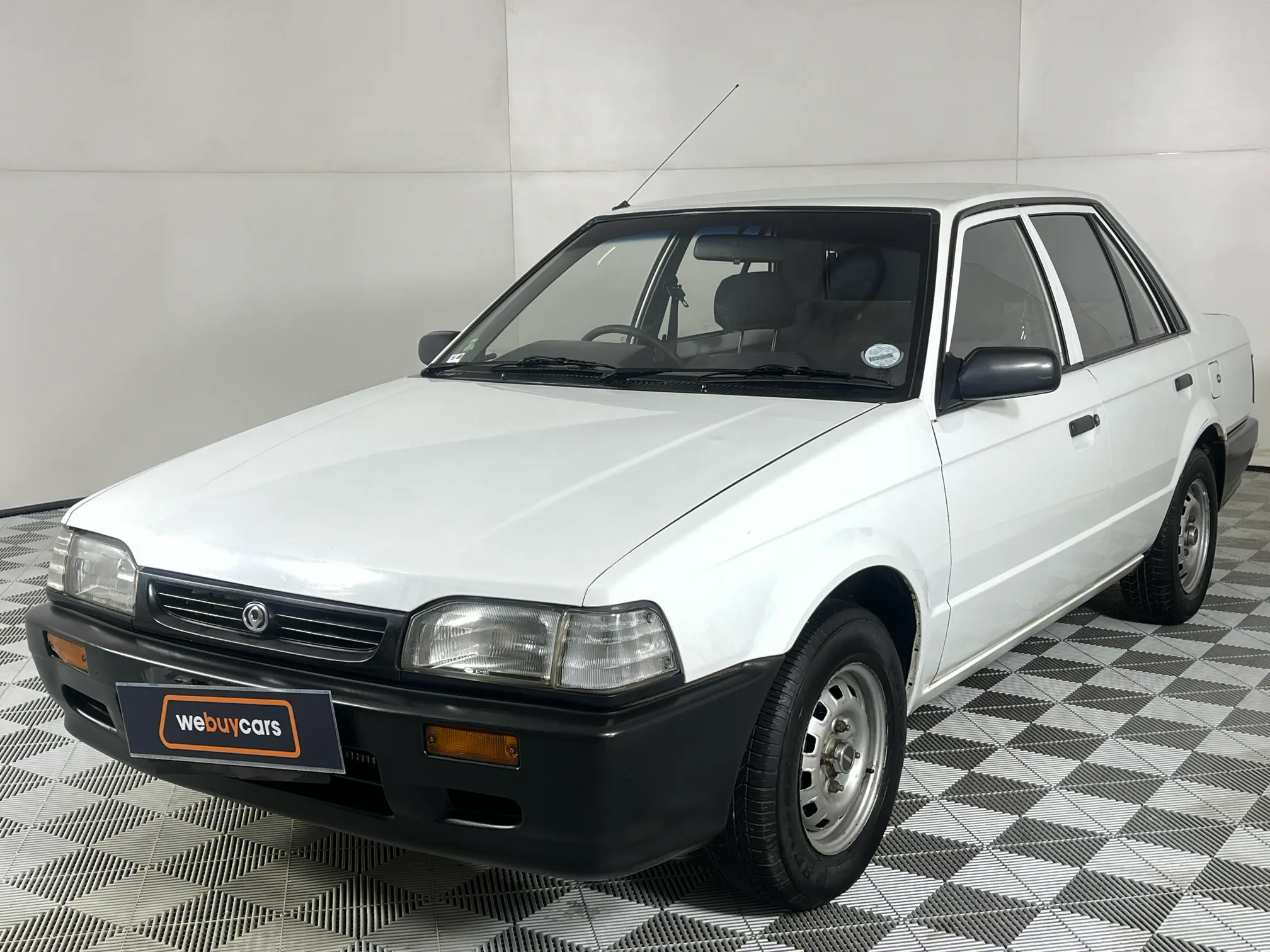 1997 Mazda 323 130 Midge Sedan